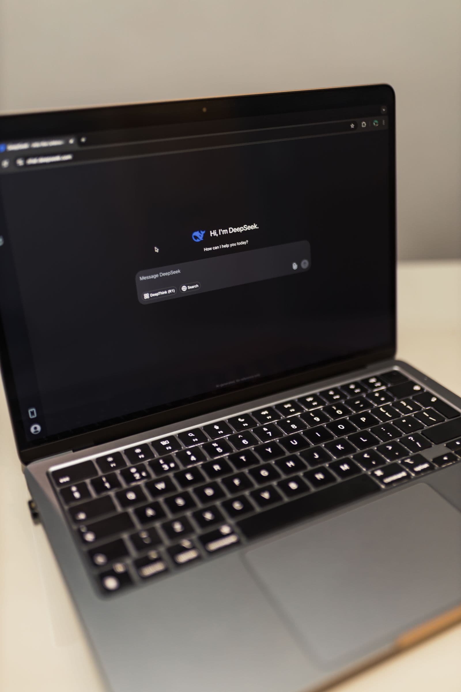 Laptop displaying an AI conversation interface